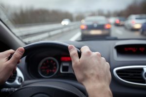 man practicing safe holiday driving 